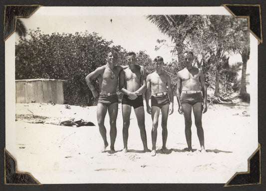 Vintage photograph showcasing early 20th-century men's swimwear, reflecting changing social norms